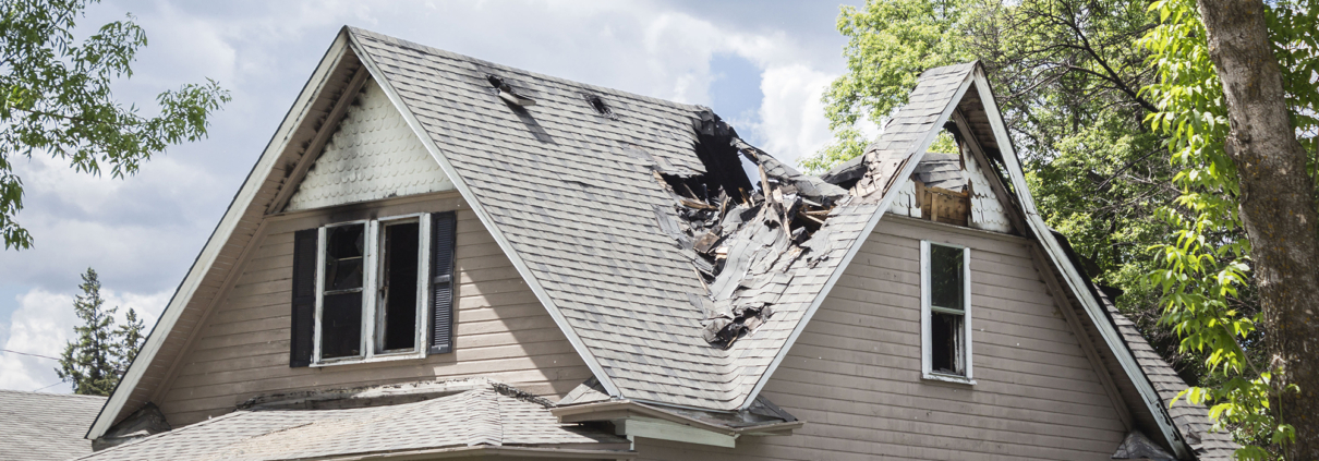 damaged roof from high wind storm